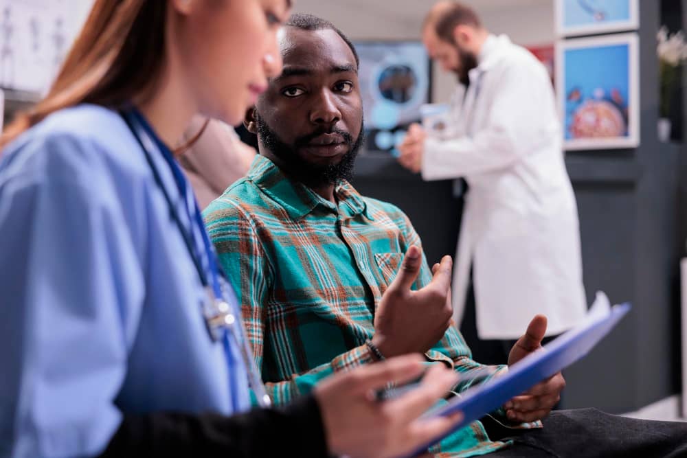 Healthcare professional giving client education